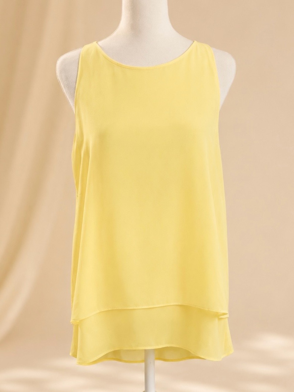 Darjoni pale lemon yellow layered sleeveless blouse, Size Small.